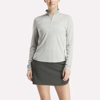 Damska bluza golfowa z długim rękawem, zaprojektowana z wykorzystaniem technologii Vector Jacquard, z zamkiem 1/4 Damska bluza golfowa z długim rękawem, zaprojektowana z wykorzystaniem technologii Vector Jacquard, z zamkiem 1/4