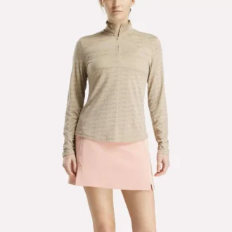 Damska bluza golfowa z długim rękawem, zaprojektowana z wykorzystaniem technologii Vector Jacquard, z zamkiem 1/4 Damska bluza golfowa z długim rękawem, zaprojektowana z wykorzystaniem technologii Vector Jacquard, z zamkiem 1/4