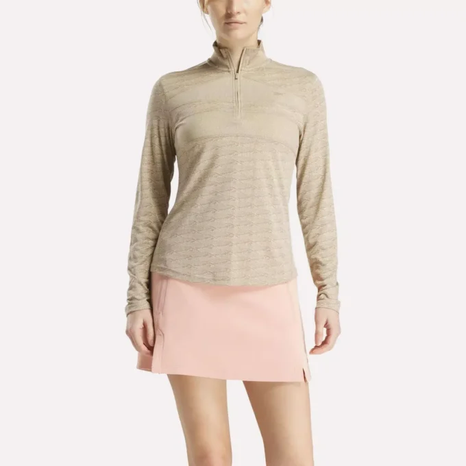 Damska bluza golfowa z długim rękawem, zaprojektowana z wykorzystaniem technologii Vector Jacquard, z zamkiem 1/4 Damska bluza golfowa z długim rękawem, zaprojektowana z wykorzystaniem technologii Vector Jacquard, z zamkiem 1/4