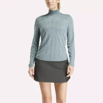 Damska bluza golfowa z długim rękawem, zaprojektowana z wykorzystaniem technologii Vector Jacquard, z zamkiem 1/4 Damska bluza golfowa z długim rękawem, zaprojektowana z wykorzystaniem technologii Vector Jacquard, z zamkiem 1/4