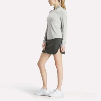 Damska bluza golfowa z długim rękawem, zaprojektowana z wykorzystaniem technologii Vector Jacquard, z zamkiem 1/4 Damska bluza golfowa z długim rękawem, zaprojektowana z wykorzystaniem technologii Vector Jacquard, z zamkiem 1/4