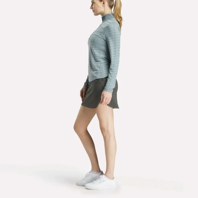 Damska bluza golfowa z długim rękawem, zaprojektowana z wykorzystaniem technologii Vector Jacquard, z zamkiem 1/4 Damska bluza golfowa z długim rękawem, zaprojektowana z wykorzystaniem technologii Vector Jacquard, z zamkiem 1/4