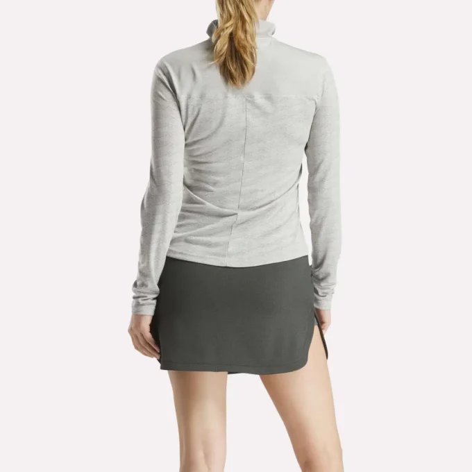 Damska bluza golfowa z długim rękawem, zaprojektowana z wykorzystaniem technologii Vector Jacquard, z zamkiem 1/4 Damska bluza golfowa z długim rękawem, zaprojektowana z wykorzystaniem technologii Vector Jacquard, z zamkiem 1/4
