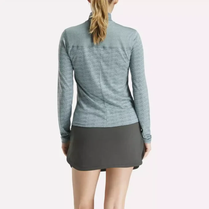 Damska bluza golfowa z długim rękawem, zaprojektowana z wykorzystaniem technologii Vector Jacquard, z zamkiem 1/4 Damska bluza golfowa z długim rękawem, zaprojektowana z wykorzystaniem technologii Vector Jacquard, z zamkiem 1/4