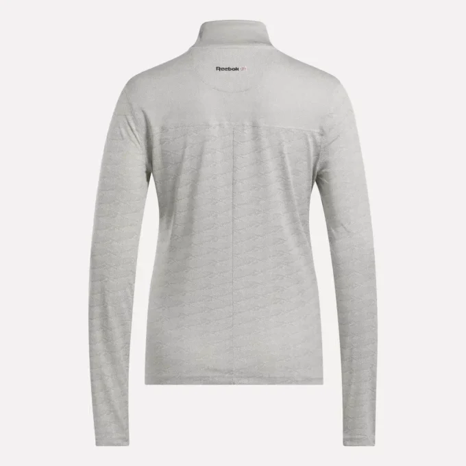 Damska bluza golfowa z długim rękawem, zaprojektowana z wykorzystaniem technologii Vector Jacquard, z zamkiem 1/4 Damska bluza golfowa z długim rękawem, zaprojektowana z wykorzystaniem technologii Vector Jacquard, z zamkiem 1/4