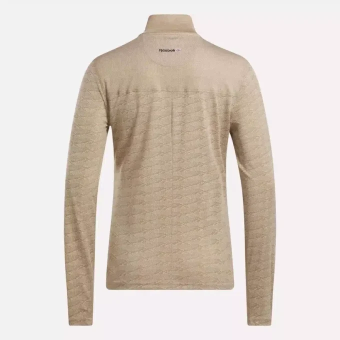 Damska bluza golfowa z długim rękawem, zaprojektowana z wykorzystaniem technologii Vector Jacquard, z zamkiem 1/4 Damska bluza golfowa z długim rękawem, zaprojektowana z wykorzystaniem technologii Vector Jacquard, z zamkiem 1/4