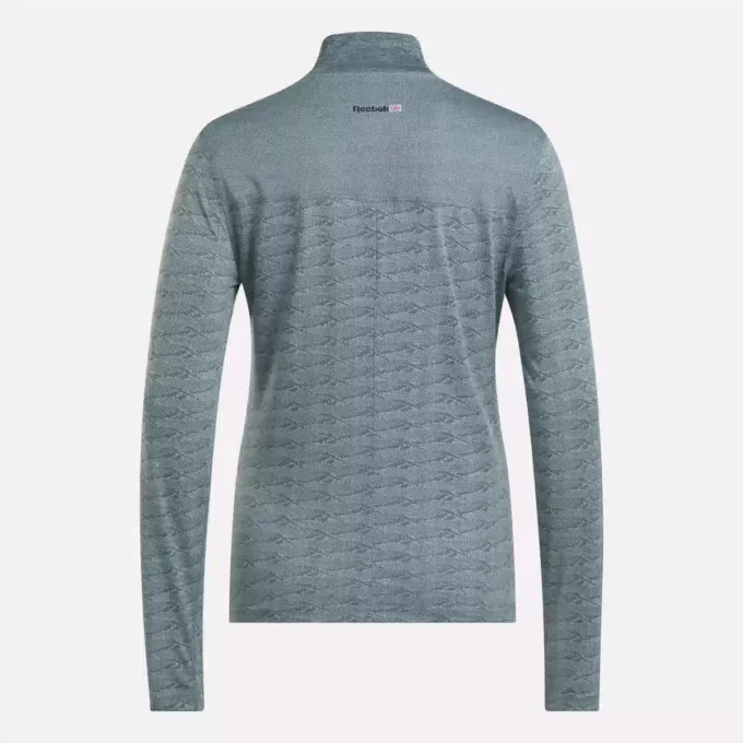 Damska bluza golfowa z długim rękawem, zaprojektowana z wykorzystaniem technologii Vector Jacquard, z zamkiem 1/4 Damska bluza golfowa z długim rękawem, zaprojektowana z wykorzystaniem technologii Vector Jacquard, z zamkiem 1/4