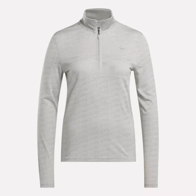 Damska bluza golfowa z długim rękawem, zaprojektowana z wykorzystaniem technologii Vector Jacquard, z zamkiem 1/4 Damska bluza golfowa z długim rękawem, zaprojektowana z wykorzystaniem technologii Vector Jacquard, z zamkiem 1/4