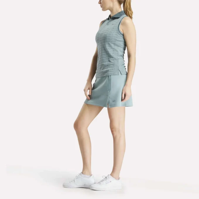 Damska koszulka golfowa polo bez rękawów z tonacyjnym wzorem Vector Jacquard Damska koszulka golfowa polo bez rękawów z tonacyjnym wzorem Vector Jacquard
