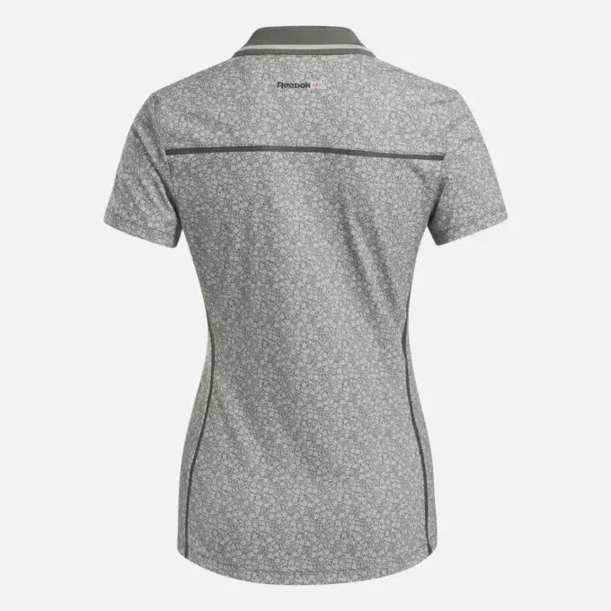 Damskie polo z krótkim rękawem, kołnierzykiem Johnny i drobnym kwiatowym wzorem Damskie polo z krótkim rękawem, kołnierzykiem Johnny i drobnym kwiatowym wzorem