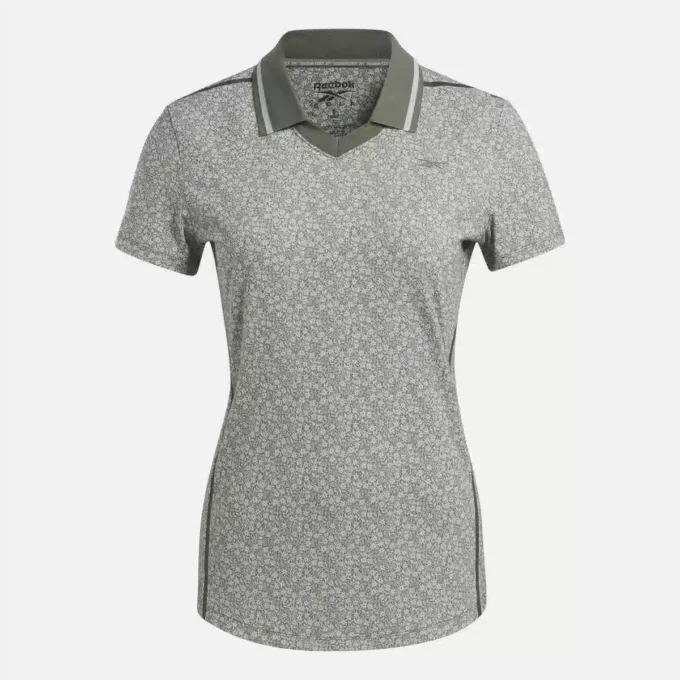 Damskie polo z krótkim rękawem, kołnierzykiem Johnny i drobnym kwiatowym wzorem Damskie polo z krótkim rękawem, kołnierzykiem Johnny i drobnym kwiatowym wzorem