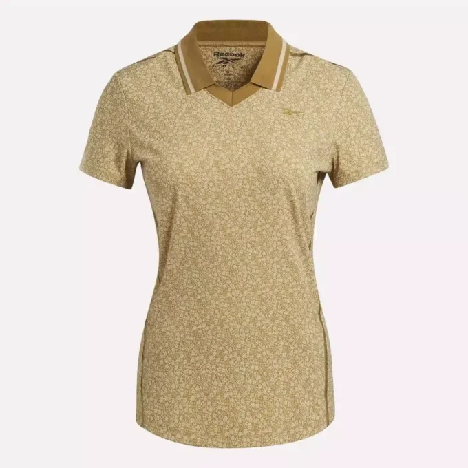 Damskie polo z krótkim rękawem, kołnierzykiem Johnny i drobnym kwiatowym wzorem Damskie polo z krótkim rękawem, kołnierzykiem Johnny i drobnym kwiatowym wzorem
