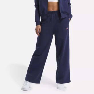 Damskie spodnie z szerokimi nogawkami i małym logo Reebok Identity